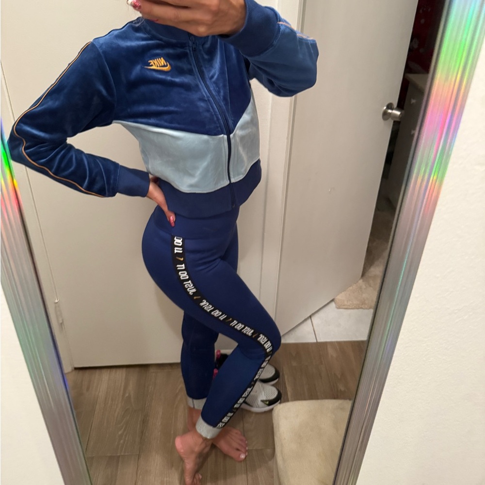 Elegant Nike tracksuit in two shades of royal blue and silver. Size XS.